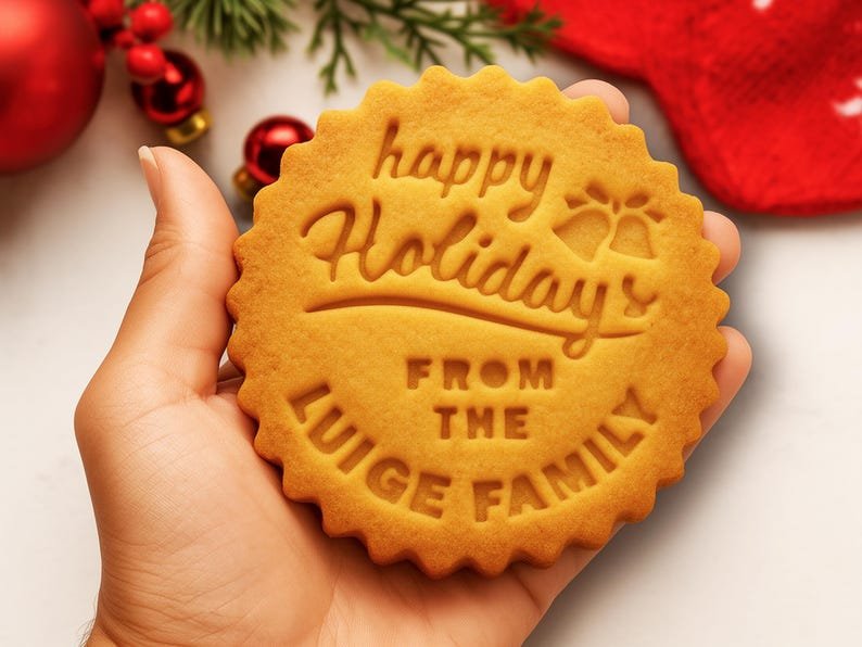 A holiday cookie made with a personalized family-name stamp.