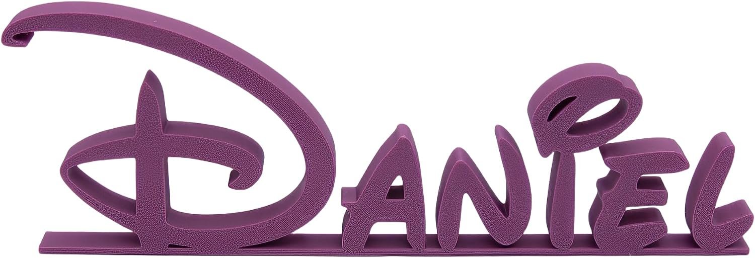 Purple personalized Daniel desk name sign.